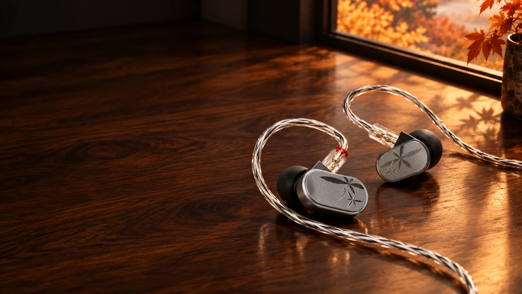 MOONDROP LAN II silver wired IEM earphones on an autumn desk