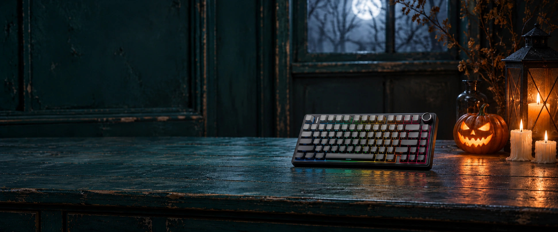 AULA F75 Pro keyboard beside a Halloween pumpkin, lantern and candles